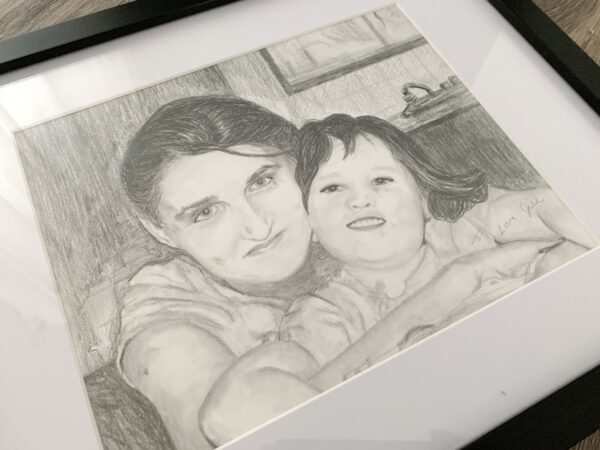 mom and child hugging drawing